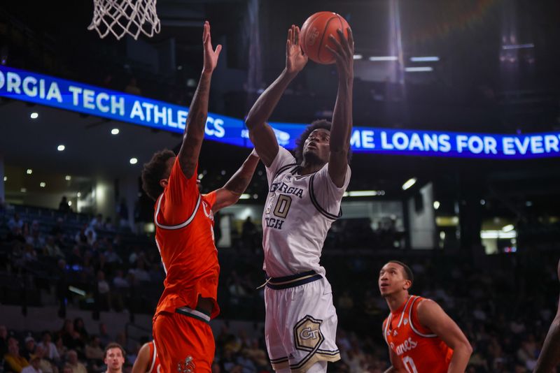 Mar 4, 2025; Atlanta, Georgia, USA; Georgia Tech Yellow Jackets forward Ibrahim Souare (30) shoots against the Miami Hurricanes in the second half at McCamish Pavilion. Mandatory Credit: Brett Davis-Imagn Images