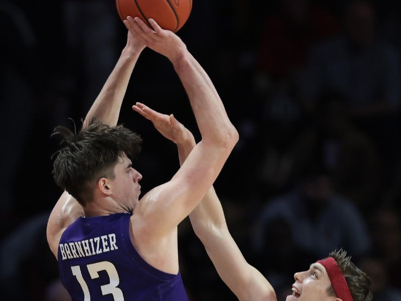 Mar 5, 2023; Piscataway, New Jersey, USA; Northwestern Wildcats guard Brooks Barnhizer (13) shoots the ball against Rutgers Scarlet Knights guard Paul Mulcahy (4) during the second half at Jersey Mike's Arena. Mandatory Credit: Vincent Carchietta-USA TODAY Sports