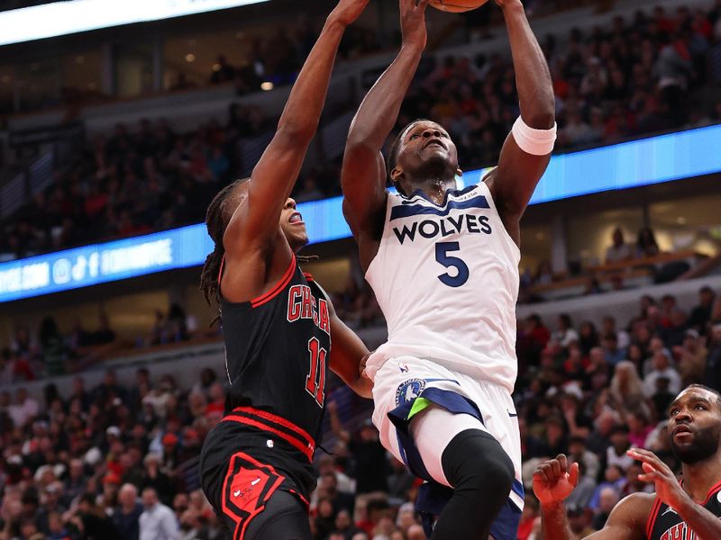 CHICAGO, ILLINOIS - NOVEMBER 07: Anthony Edwards #5 of the Minnesota Timberwolves goes up for a layup against the Chicago Bulls during the second half at the United Center on November 07, 2024 in Chicago, Illinois. NOTE TO USER: User expressly acknowledges and agrees that, by downloading and or using this photograph, User is consenting to the terms and conditions of the Getty Images License Agreement.  (Photo by Michael Reaves/Getty Images)