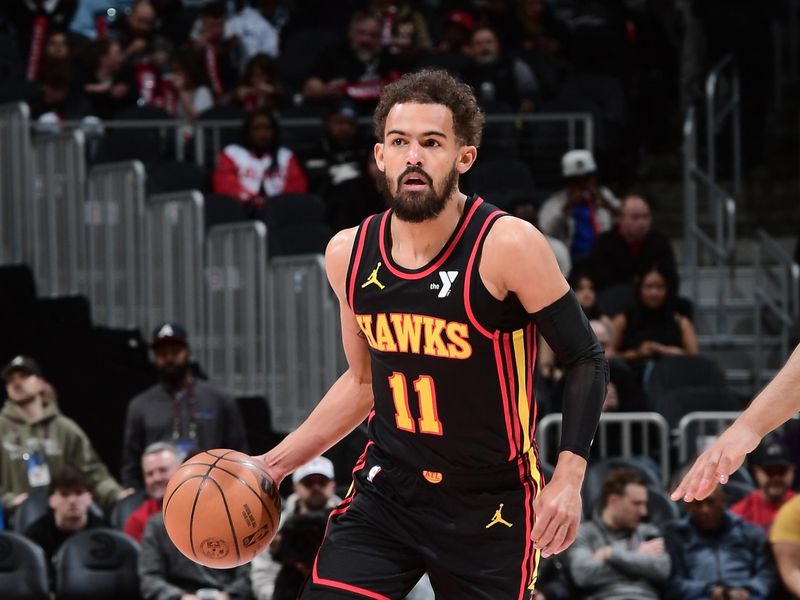 ATLANTA, GA - MARCH 6:  Trae Young #11 of the Atlanta Hawks dribbles the ball during the game against the Indiana Pacers on March 6, 2025 at State Farm Arena in Atlanta, Georgia.  NOTE TO USER: User expressly acknowledges and agrees that, by downloading and/or using this Photograph, user is consenting to the terms and conditions of the Getty Images License Agreement. Mandatory Copyright Notice: Copyright 2025 NBAE (Photo by Scott Cunningham/NBAE via Getty Images)