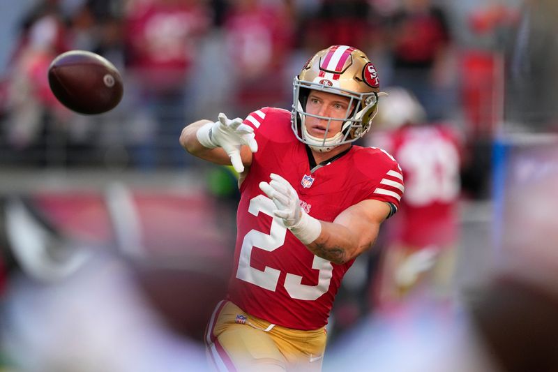 San Francisco 49ers running back Christian McCaffrey warms up before an NFL football game against the Arizona Cardinals Sunday, Dec. 17, 2023, in Glendale, Ariz. (AP Photo/Matt York)