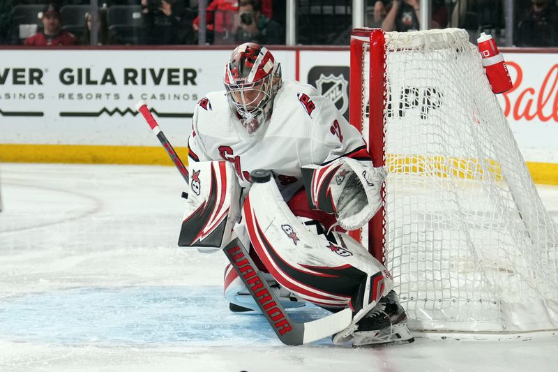 Mar 3, 2023; Tempe, Arizona, USA; Carolina Hurricanes goaltender Antti Raanta (32) makes a save against the Arizona Coyotes during the second period at Mullett Arena. Mandatory Credit: Joe Camporeale-USA TODAY Sports