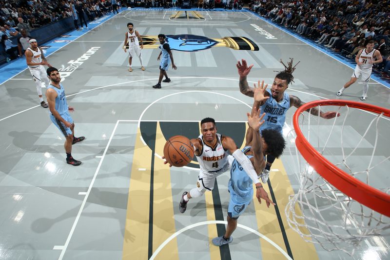 MEMPHIS, TN - NOVEMBER 19: Russell Westbrook #4 of the Denver Nuggets drives to the basket during the game against the Memphis Grizzlies during the Emirates NBA Cup game on November 19, 2024 at FedExForum in Memphis, Tennessee. NOTE TO USER: User expressly acknowledges and agrees that, by downloading and or using this photograph, User is consenting to the terms and conditions of the Getty Images License Agreement. Mandatory Copyright Notice: Copyright 2024 NBAE (Photo by Joe Murphy/NBAE via Getty Images)