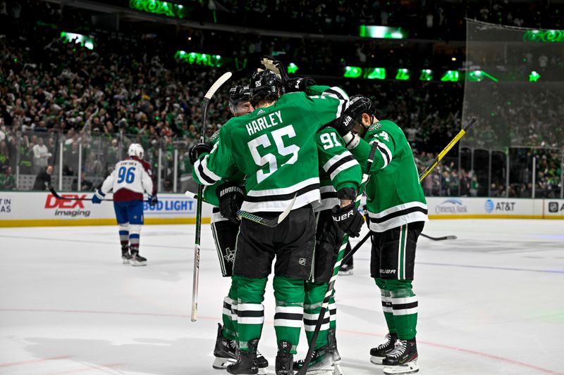 May 9, 2024; Dallas, Texas, USA; Dallas Stars center Tyler Seguin (91) and defenseman Thomas Harley (55) and left wing Jamie Benn (14) and center Joe Pavelski (16) celebrates after Seguin scores a shorthanded goal against the Colorado Avalanche during the second period in game two of the second round of the 2024 Stanley Cup Playoffs at American Airlines Center. Mandatory Credit: Jerome Miron-USA TODAY Sports