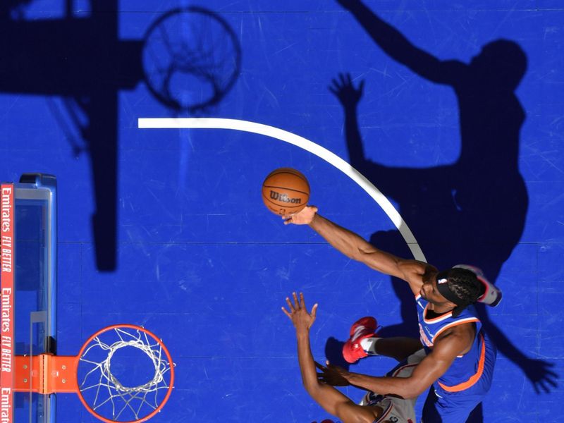 PHILADELPHIA, PA - JANUARY 15: Precious Achiuwa #5 of the New York Knicks drives to the basket during the game against the Philadelphia 76ers on January 15, 2025 at the Wells Fargo Center in Philadelphia, Pennsylvania NOTE TO USER: User expressly acknowledges and agrees that, by downloading and/or using this Photograph, user is consenting to the terms and conditions of the Getty Images License Agreement. Mandatory Copyright Notice: Copyright 2025 NBAE (Photo by Jesse D. Garrabrant/NBAE via Getty Images)