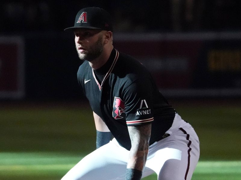 Jul 29, 2023; Phoenix, Arizona, USA; Arizona Diamondbacks first baseman Christian Walker (53) gets in position against the Seattle Mariners during the first inning at Chase Field. Mandatory Credit: Joe Camporeale-USA TODAY Sports