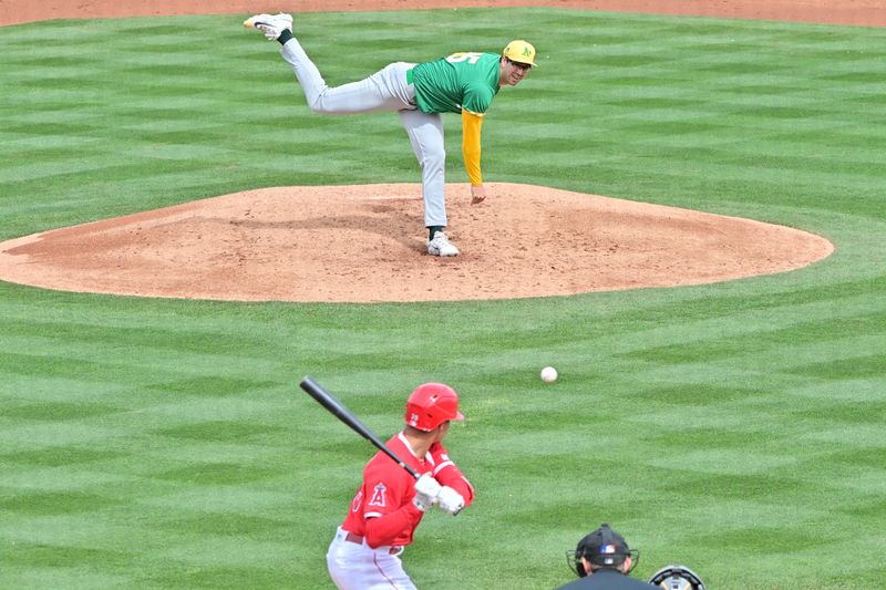 Mar 6, 2024; Tempe, Arizona, USA;  Oakland Athletics relief pitcher Joe Boyle (35) throws to Los Angeles Angels right fielder Jordyn Adams (39) in the second inning during a spring training game at Tempe Diablo Stadium. Mandatory Credit: Matt Kartozian-USA TODAY Sports