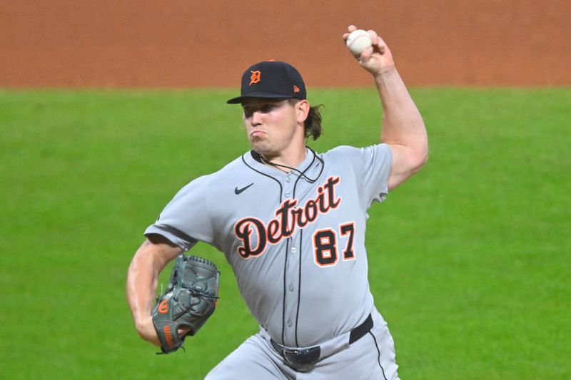 Sep 25, 2025; Cleveland, Ohio, USA; Detroit Tigers relief pitcher Tyler Holton (87) delivers a pitch in the seventh inning against the Cleveland Guardians at Progressive Field. Mandatory Credit: David Richard-Imagn Images