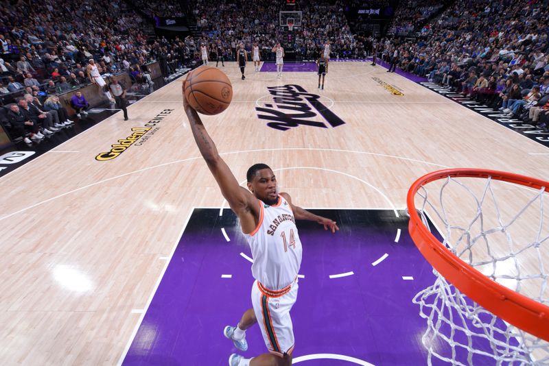 SACRAMENTO, CA - MARCH 7: Blake Wesley #14 of the San Antonio Spurs dunks the ball during the game against the Sacramento Kings on March 7, 2024 at Golden 1 Center in Sacramento, California. NOTE TO USER: User expressly acknowledges and agrees that, by downloading and or using this Photograph, user is consenting to the terms and conditions of the Getty Images License Agreement. Mandatory Copyright Notice: Copyright 2024 NBAE (Photo by Rocky Widner/NBAE via Getty Images)