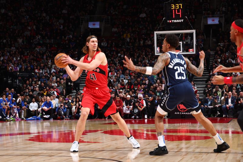 TORONTO, CANADA - FEBRUARY 28: Kelly Olynyk #41 of the Toronto Raptors looks to pass the ball during the game against the Dallas Mavericks on February 28, 2024 at the Scotiabank Arena in Toronto, Ontario, Canada.  NOTE TO USER: User expressly acknowledges and agrees that, by downloading and or using this Photograph, user is consenting to the terms and conditions of the Getty Images License Agreement.  Mandatory Copyright Notice: Copyright 2024 NBAE (Photo by Vaughn Ridley/NBAE via Getty Images)