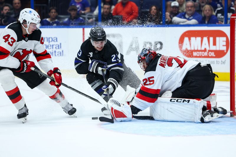 Nov 16, 2024; Tampa, Florida, USA; Tampa Bay Lightning center Michael Eyssimont (23) shoots the puck against the New Jersey Devils in the third period at Amalie Arena. Mandatory Credit: Nathan Ray Seebeck-Imagn Images