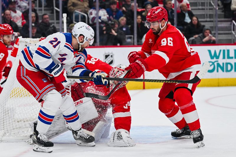 Apr 5, 2024; Detroit, Michigan, USA; Detroit Red Wings goaltender Alex Lyon (34) makes a save in front of defenseman Jake Walman (96) and New York Rangers center Barclay Goodrow (21) during the game at Little Caesars Arena. Mandatory Credit: Tim Fuller-USA TODAY Sports