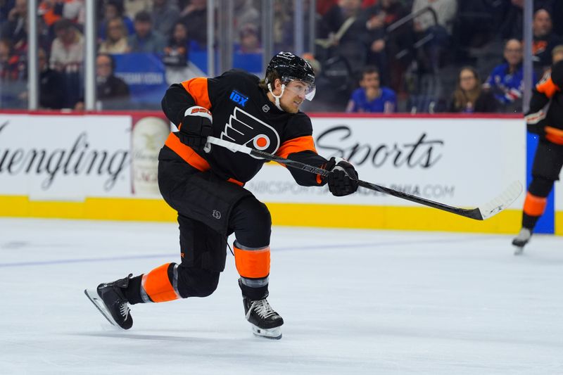 Nov 29, 2024; Philadelphia, Pennsylvania, USA; Philadelphia Flyers defenseman Travis Sanheim (6) shoots the puck against the New York Rangers in the first period at Wells Fargo Center. Mandatory Credit: Kyle Ross-Imagn Images