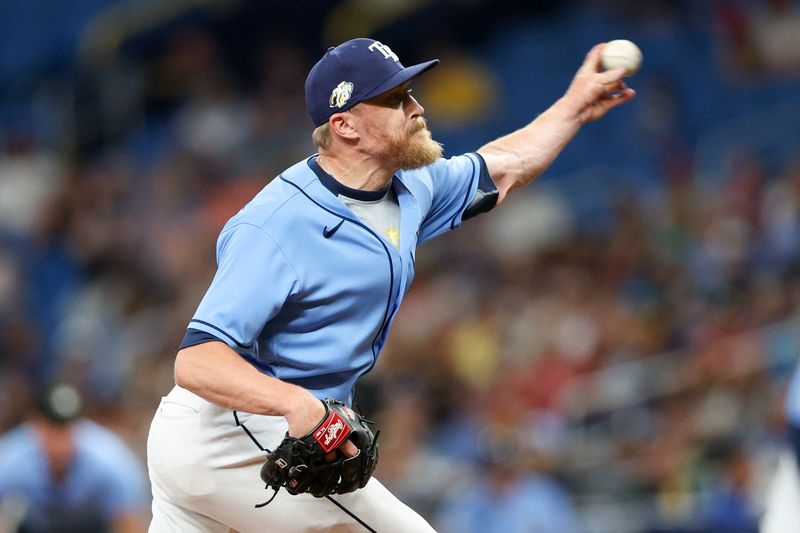 Jul 6, 2023; St. Petersburg, Florida, USA;  Tampa Bay Rays relief pitcher Jake Diekman (30) throws a pitch against the Philadelphia Phillies in the fifth inning at Tropicana Field. Mandatory Credit: Nathan Ray Seebeck-USA TODAY Sports