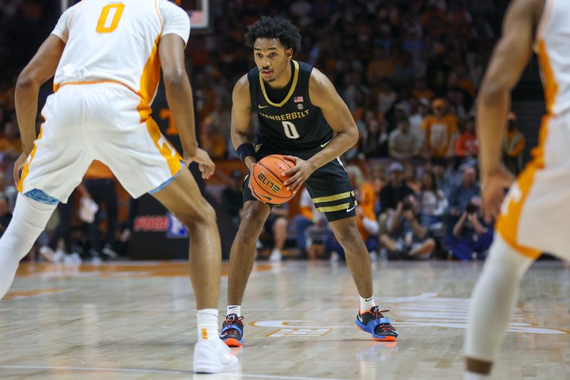 Feb 17, 2024; Knoxville, Tennessee, USA; Vanderbilt Commodores guard Tyrin Lawrence (0) looks to move the ball against the Tennessee Volunteers during the first half at Thompson-Boling Arena at Food City Center. Mandatory Credit: Randy Sartin-USA TODAY Sports