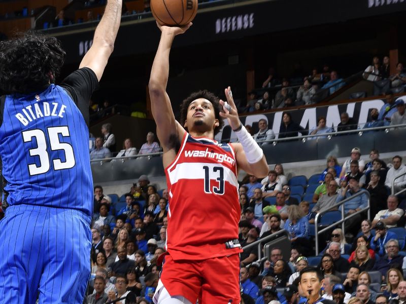 ORLANDO, FL - FEBRUARY 23:  Jordan Poole #13 of the Washington Wizards shoots the ball during the game against the Orlando Magic on February 23, 2025 at Kia Center in Orlando, Florida. NOTE TO USER: User expressly acknowledges and agrees that, by downloading and or using this photograph, User is consenting to the terms and conditions of the Getty Images License Agreement. Mandatory Copyright Notice: Copyright 2025 NBAE (Photo by Gary Bassing/NBAE via Getty Images)