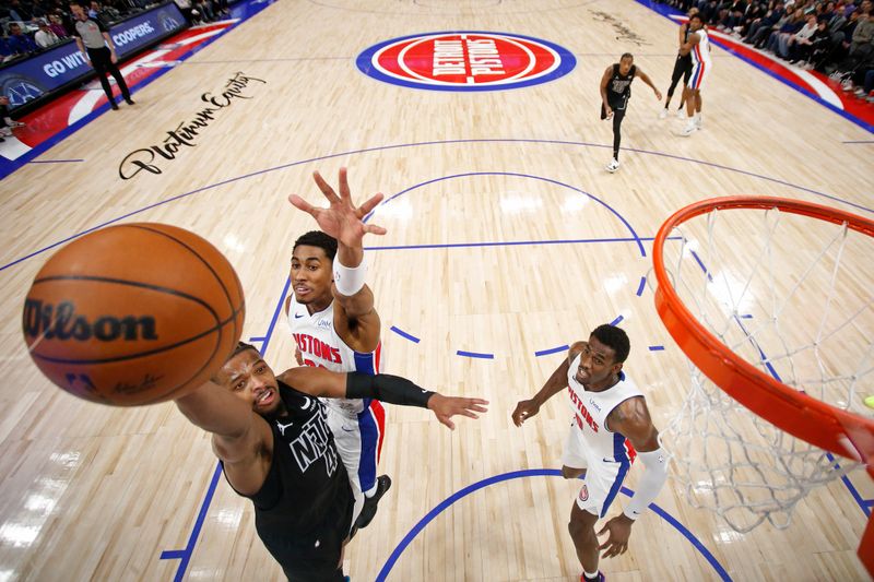 DETROIT, MI - MARCH 7: Dennis Smith Jr. #4 of the Brooklyn Nets drives to the basket during the game against the Detroit Pistons on March 7, 2024 at Little Caesars Arena in Detroit, Michigan. NOTE TO USER: User expressly acknowledges and agrees that, by downloading and/or using this photograph, User is consenting to the terms and conditions of the Getty Images License Agreement. Mandatory Copyright Notice: Copyright 2024 NBAE (Photo by Brian Sevald/NBAE via Getty Images)