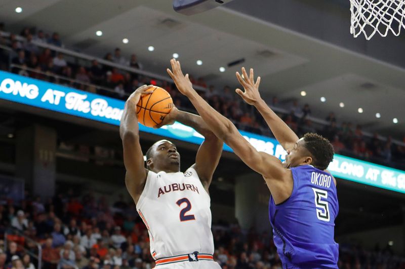 Nov 27, 2022; Auburn, Alabama, USA;  Auburn Tigers forward Jaylin Williams (2) shoots as Saint Louis Billikens forward Francis Okoro (5) defends during the second half at Neville Arena. Mandatory Credit: John Reed-USA TODAY Sports