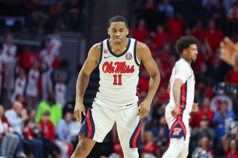 Mar 5, 2025; Oxford, Mississippi, USA; Mississippi Rebels guard Matthew Murrell (11) reacts against the Tennessee Volunteers during the second half at The Sandy and John Black Pavilion at Ole Miss. Mandatory Credit: Wesley Hale-Imagn Images