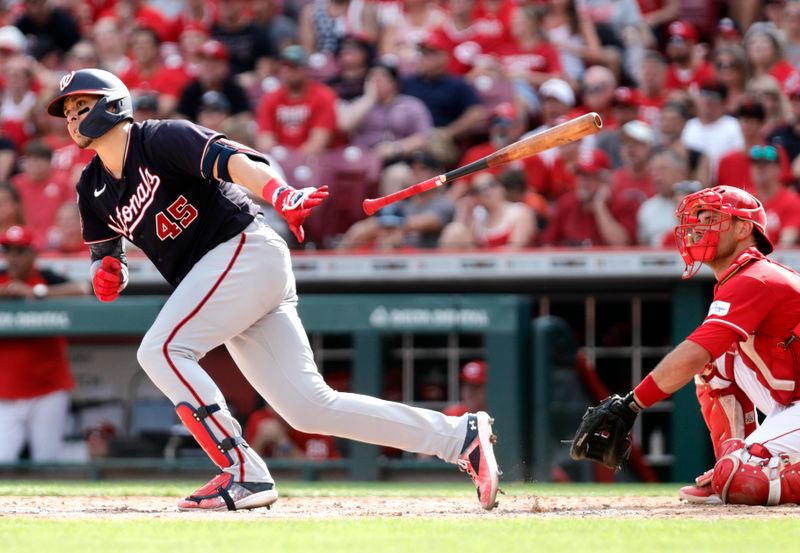 Aug 5, 2023; Cincinnati, Ohio, USA; Washington Nationals first baseman Joey Meneses (45) hits a double against the Cincinnati Reds during the sixth inning at Great American Ball Park. Mandatory Credit: David Kohl-USA TODAY Sports