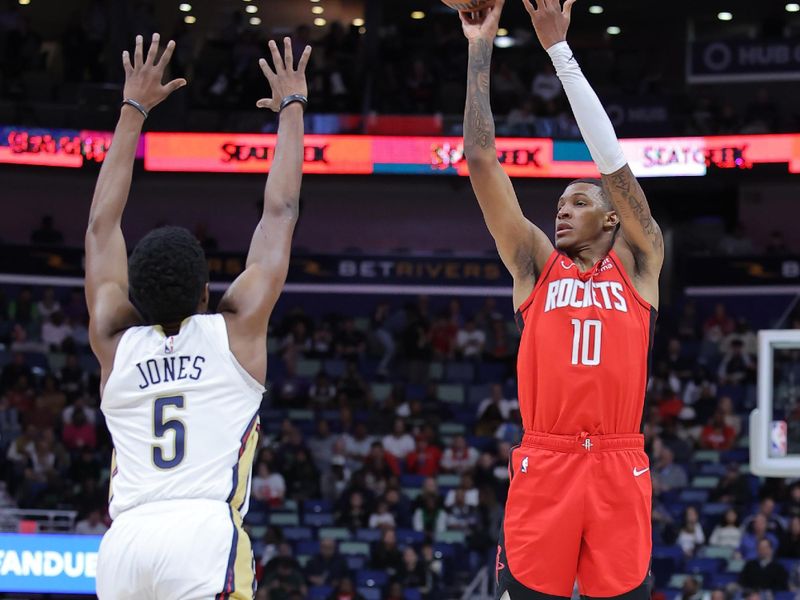 NEW ORLEANS, LOUISIANA - FEBRUARY 22: Jabari Smith Jr. #10 of the Houston Rockets shoots over Herbert Jones #5 of the New Orleans Pelicans during the first half at the Smoothie King Center on February 22, 2024 in New Orleans, Louisiana. NOTE TO USER: User expressly acknowledges and agrees that, by downloading and or using this Photograph, user is consenting to the terms and conditions of the Getty Images License Agreement. (Photo by Jonathan Bachman/Getty Images)