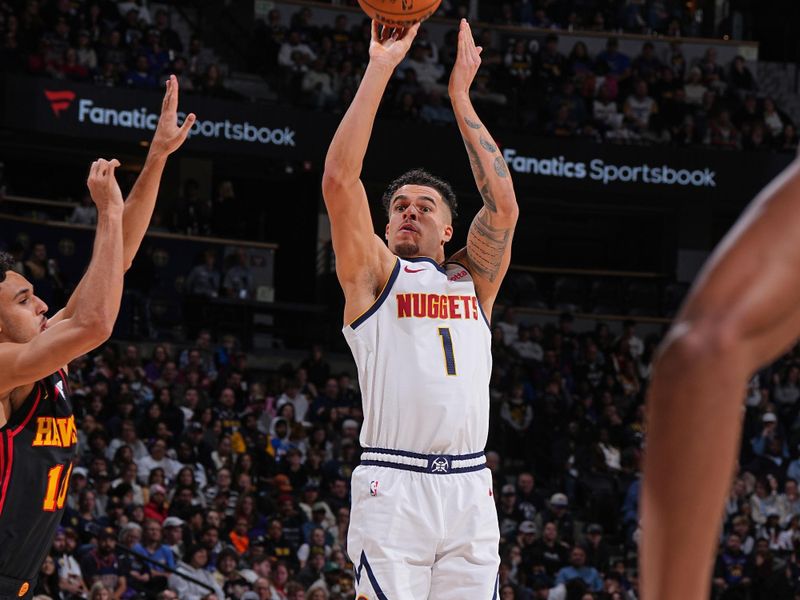 DENVER, CO - JANUARY 1: Michael Porter Jr. #1 of the Denver Nuggets shoots the ball during the game against the Atlanta Hawks on January 1, 2025 at Ball Arena in Denver, Colorado. NOTE TO USER: User expressly acknowledges and agrees that, by downloading and/or using this Photograph, user is consenting to the terms and conditions of the Getty Images License Agreement. Mandatory Copyright Notice: Copyright 2025 NBAE (Photo by Garrett Ellwood/NBAE via Getty Images)