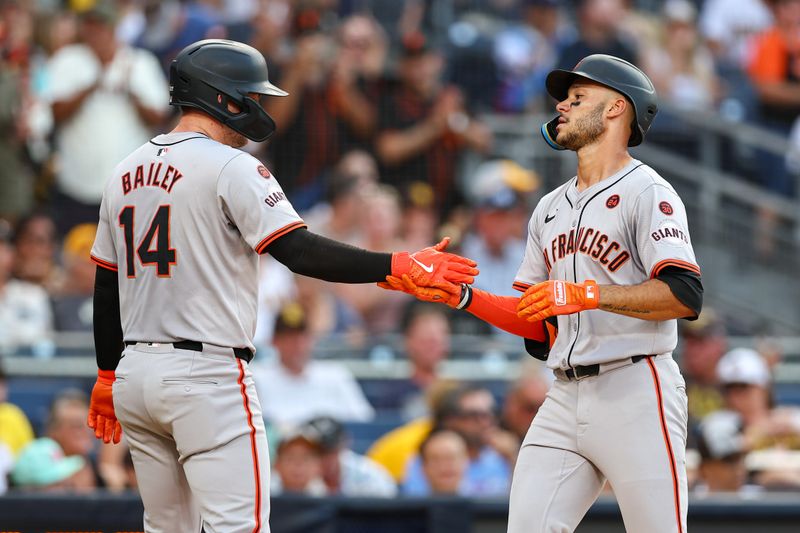 Sep 7, 2024; San Diego, California, USA; San Francisco Giants center fielder Grant McCray (58) celebrates with catcher Patrick Bailey (14) after hitting a three run home run against the San Diego Padres during the second inning at Petco Park. Mandatory Credit: Chadd Cady-Imagn Images