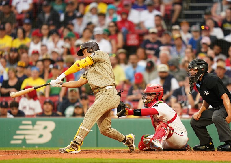 Jun 30, 2024; Boston, Massachusetts, USA; San Diego Padres shortstop Ha-Seong Kim (7) hits a double to left field to drive in a run against the Boston Red Sox in the seventh inning at Fenway Park. Mandatory Credit: David Butler II-USA TODAY Sports