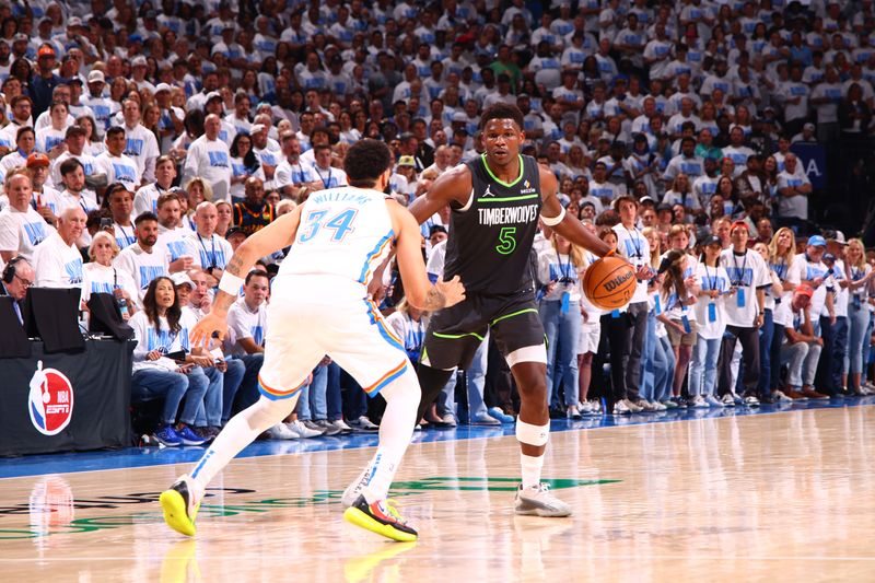 OKLAHOMA CITY, OK - MAY 20: Anthony Edwards #5 of the Minnesota Timberwolves dribbles the ball during the game against the Oklahoma City Thunder during Game 1 of the 2025 Western Conference Finals on May 20, 2025 at Paycom Center in Oklahoma City, Oklahoma. NOTE TO USER: User expressly acknowledges and agrees that, by downloading and or using this photograph, User is consenting to the terms and conditions of the Getty Images License Agreement. Mandatory Copyright Notice: Copyright 2025 NBAE (Photo by Zach Beeker/NBAE via Getty Images)