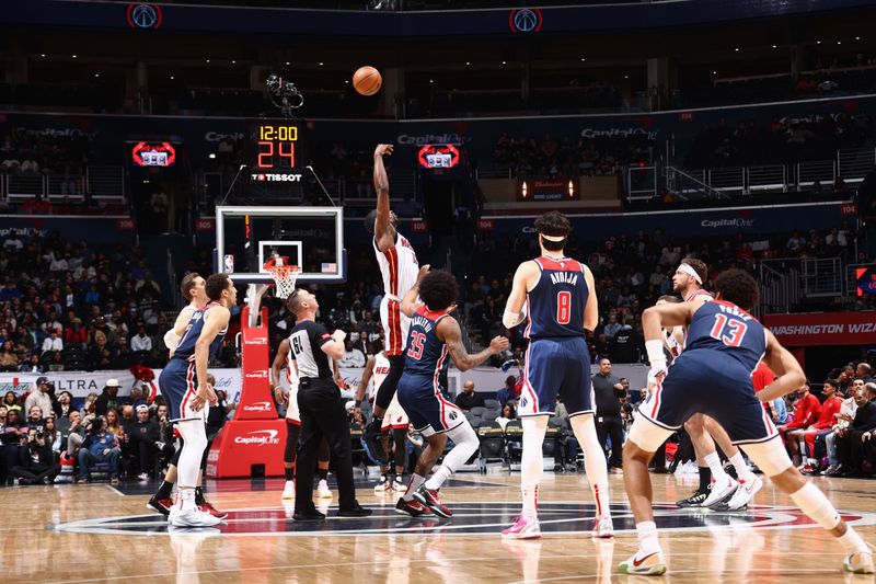 WASHINGTON, DC -? MARCH 31:  The Miami Heat goes for the tipoff against the Washington Wizards on March 31, 2024 at Capital One Arena in Washington, DC. NOTE TO USER: User expressly acknowledges and agrees that, by downloading and or using this Photograph, user is consenting to the terms and conditions of the Getty Images License Agreement. Mandatory Copyright Notice: Copyright 2024 NBAE (Photo by Kenny Giarla/NBAE via Getty Images)