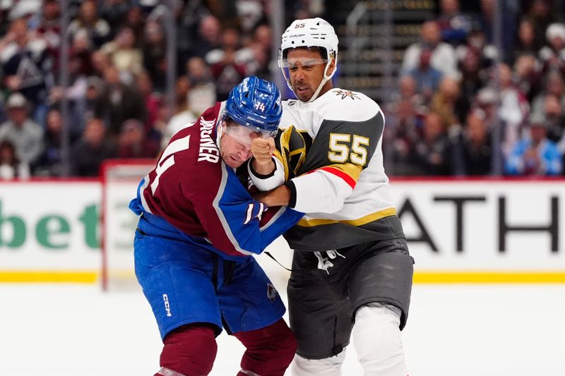 Apr 8, 2025; Denver, Colorado, USA; Vegas Golden Knights right wing Keegan Kolesar (55) and Colorado Avalanche right wing Chris Wagner (14) fight in the first period at Ball Arena. Mandatory Credit: Ron Chenoy-Imagn Images