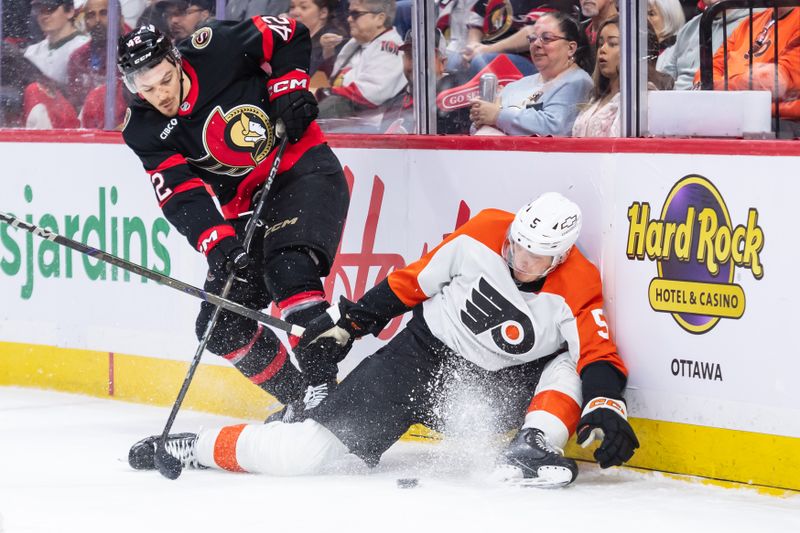Apr 13, 2025; Ottawa, Ontario, CAN; Philadelphia Flyers defenseman Egor Zamula (5) is taken off the puck by Ottawa Senators right wing Hayden Hodgson (42) in the first period at the Canadian Tire Centre. Mandatory Credit: Marc DesRosiers-Imagn Images