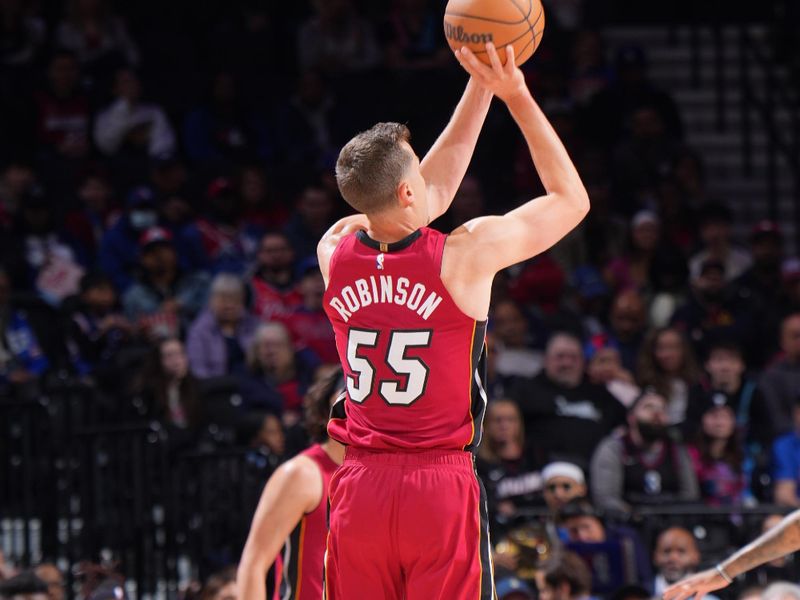 PHILADELPHIA, PA - MARCH 18: Duncan Robinson #55 of the Miami Heat shoots a three point basket during the game against the Philadelphia 76ers on March 18, 2024 at the Wells Fargo Center in Philadelphia, Pennsylvania NOTE TO USER: User expressly acknowledges and agrees that, by downloading and/or using this Photograph, user is consenting to the terms and conditions of the Getty Images License Agreement. Mandatory Copyright Notice: Copyright 2024 NBAE (Photo by Jesse D. Garrabrant/NBAE via Getty Images)