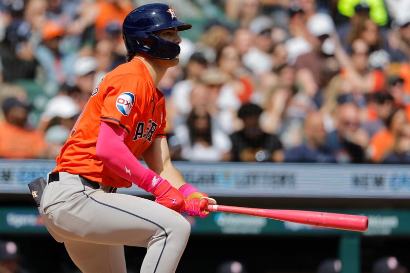 May 12, 2024; Detroit, Michigan, USA;  Houston Astros center fielder Joey Loperfido (10) hits an RBI double in the eighth inning against the Detroit Tigers at Comerica Park. Mandatory Credit: Rick Osentoski-USA TODAY Sports