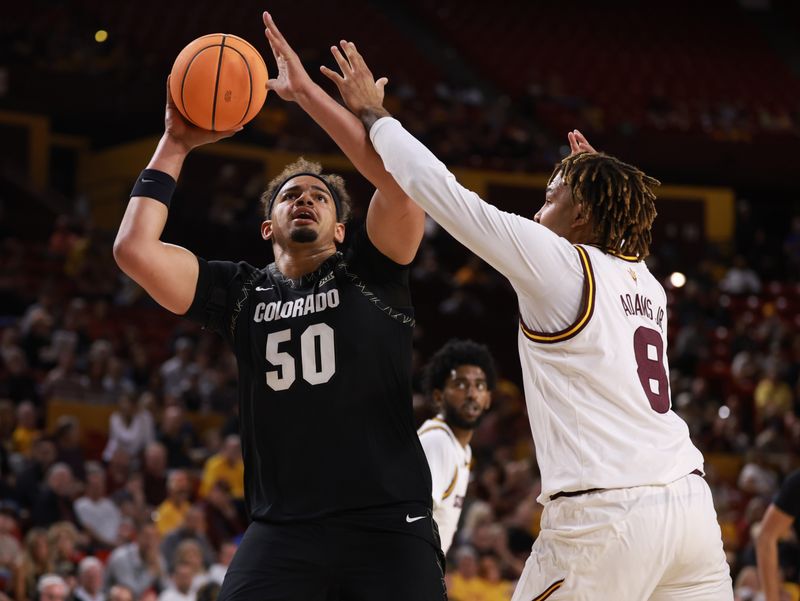 Jan 3, 2026; Tempe, Arizona, USA; Colorado Buffaloes center Elijah Malone (50) against Arizona State Sun Devils forward Marcus Adams Jr. (8) in the first half at Desert Financial Arena. Mandatory Credit: Mark J. Rebilas-Imagn Images