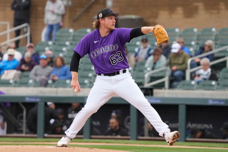 Mar 2, 2023; Salt River Pima-Maricopa, Arizona, USA; Colorado Rockies starting pitcher Noah Davis (63) throws against the Chicago White Sox in the first inning at Salt River Fields at Talking Stick. Mandatory Credit: Rick Scuteri-USA TODAY Sports