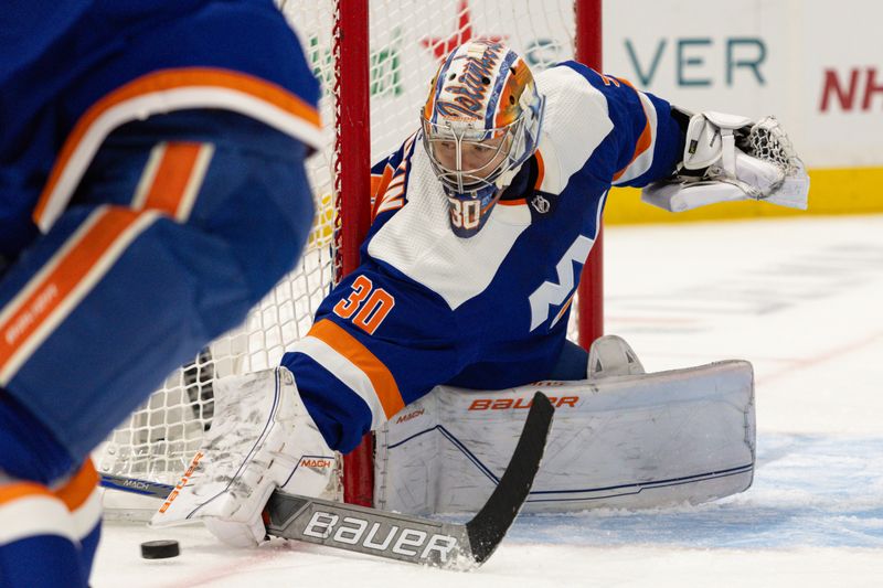 Nov 25, 2023; Elmont, New York, USA; New York Islanders goaltender Ilya Sorokin (30) stops the puck against the Philadelphia Flyers during the first period at UBS Arena. Mandatory Credit: Thomas Salus-USA TODAY Sports