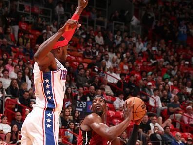 MIAMI, FL - DECEMBER 25:  Bam Adebayo #13 of the Miami Heat handles the ball during the game  on December 25, 2023 at Kaseya Center Arena in Miami, Florida. NOTE TO USER: User expressly acknowledges and agrees that, by downloading and or using this Photograph, user is consenting to the terms and conditions of the Getty Images License Agreement. Mandatory Copyright Notice: Copyright 2023 NBAE (Photo by Issac Baldizon/NBAE via Getty Images)