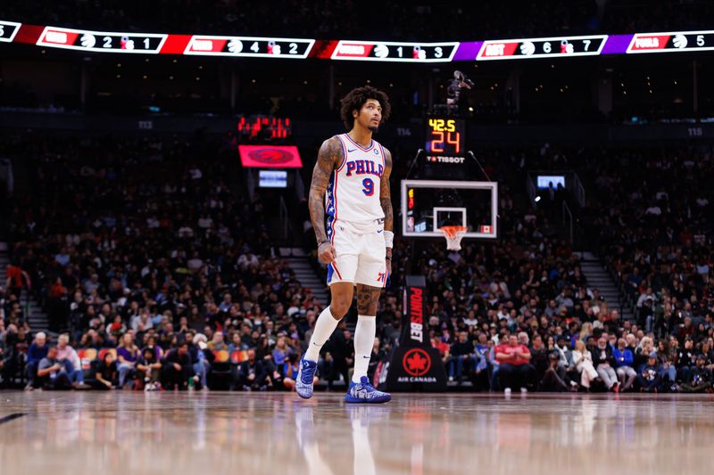 TORONTO, CANADA - OCTOBER 25: Kelly Oubre Jr. #9 of the Philadelphia 76ers walks the court during a break in play in the first half of their NBA game  at Scotiabank Arena on October 25, 2024 in Toronto, Ontario, Canada. NOTE TO USER: User expressly acknowledges and agrees that, by downloading and or using this photograph, User is consenting to the terms and conditions of the Getty Images License Agreement. (Photo by Cole Burston/Getty Images)