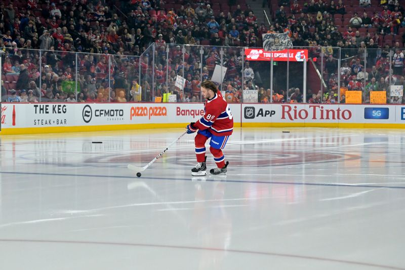 Jan 13, 2024; Montreal, Quebec, CAN; Montreal Canadiens forward Joshua Roy (89) takes a rookie solo lap during the warmup period before the game against the Edmonton Oilers at the Bell Centre. Mandatory Credit: Eric Bolte-USA TODAY Sports