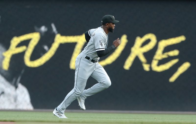Apr 8, 2023; Pittsburgh, Pennsylvania, USA;  Chicago White Sox center fielder Luis Robert Jr. (88) warms up in the outfield before the game against the Pittsburgh Pirates at PNC Park. Mandatory Credit: Charles LeClaire-USA TODAY Sports