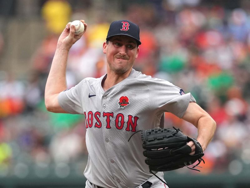 May 27, 2024; Baltimore, Maryland, USA; Boston Red Sox starting pitcher Cooper Criswell (64) delivers a pitch in the fourth inning against the Baltimore Orioles at Oriole Park at Camden Yards. Mandatory Credit: Mitch Stringer-USA TODAY Sports