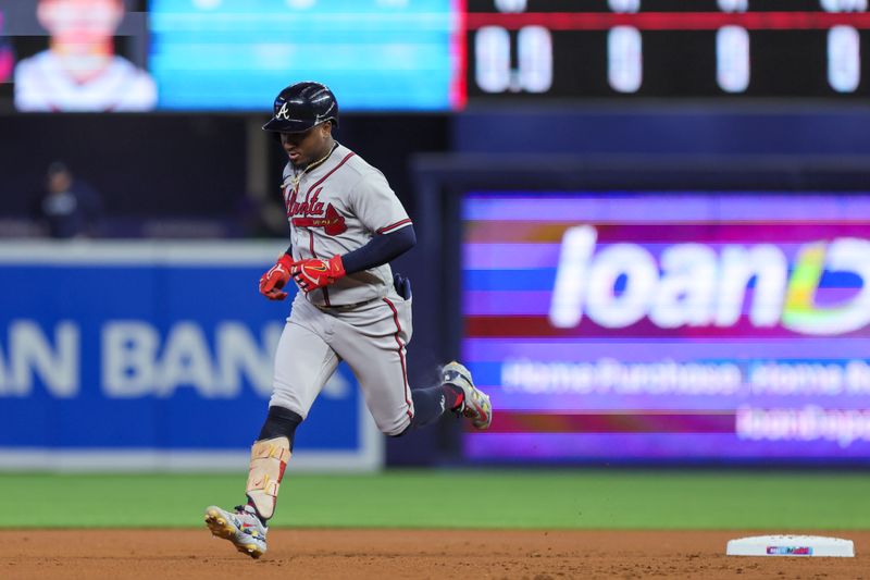 Sep 16, 2023; Miami, Florida, USA; Atlanta Braves second baseman Ozzie Albies (1) circles the bases after hitting a two-run home run against the Miami Marlins during the first inning at loanDepot Park. Mandatory Credit: Sam Navarro-USA TODAY Sports