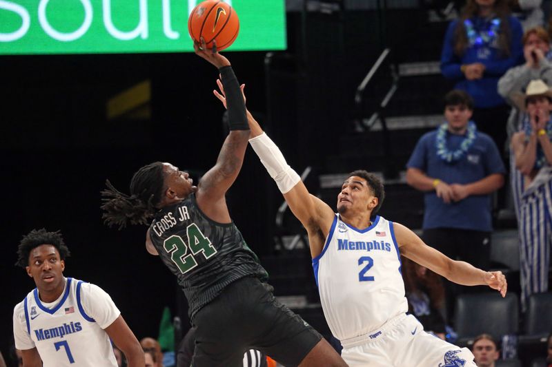 Feb 11, 2024; Memphis, Tennessee, USA; Tulane Green Wave forward Kevin Cross (24) shoots as Memphis Tigers forward Nicholas Jourdain (2) during the first half at FedExForum. Mandatory Credit: Petre Thomas-USA TODAY Sports