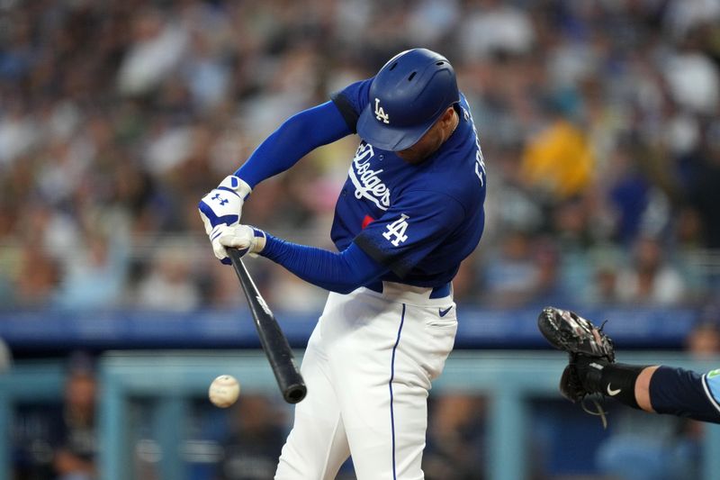 Jul 25, 2023; Los Angeles, California, USA; Los Angeles Dodgers first baseman Freddie Freeman (5) bats in the third inning against the Toronto Blue Jays at Dodger Stadium. Mandatory Credit: Kirby Lee-USA TODAY Sports