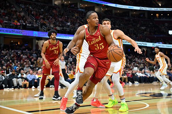 CLEVELAND, OHIO - NOVEMBER 28: Isaac Okoro #35 of the Cleveland Cavaliers drives to the basket during the fourth quarter of an NBA In-Season Tournament game against the Atlanta Hawks at Rocket Mortgage Fieldhouse on November 28, 2023 in Cleveland, Ohio. The Cavaliers defeated the Hawks 128-105. NOTE TO USER: User expressly acknowledges and agrees that, by downloading and or using this photograph, User is consenting to the terms and conditions of the Getty Images License Agreement. (Photo by Jason Miller/Getty Images)