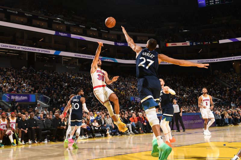 SAN FRANCISCO, CA - DECEMBER 8: Stephen Curry #30 of the Golden State Warriors shoots the ball during the game against the Minnesota Timberwolves during a regular season game on December 8, 2024 at Chase Center in San Francisco, California. NOTE TO USER: User expressly acknowledges and agrees that, by downloading and or using this photograph, user is consenting to the terms and conditions of Getty Images License Agreement. Mandatory Copyright Notice: Copyright 2024 NBAE (Photo by Noah Graham/NBAE via Getty Images)