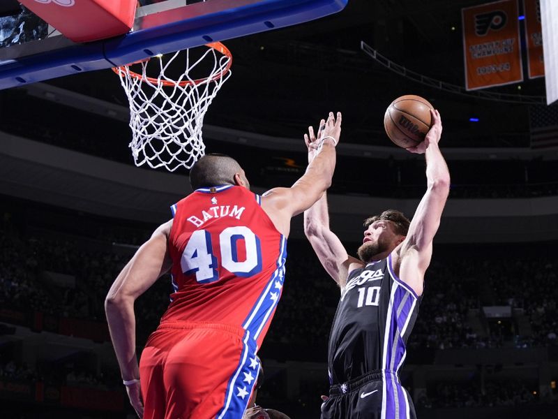 PHILADELPHIA, PA - JANUARY 12: Domantas Sabonis #10 of the Sacramento Kings goes to the basket during the game on January 12, 2024 at the Wells Fargo Center in Philadelphia, Pennsylvania NOTE TO USER: User expressly acknowledges and agrees that, by downloading and/or using this Photograph, user is consenting to the terms and conditions of the Getty Images License Agreement. Mandatory Copyright Notice: Copyright 2024 NBAE (Photo by Jesse D. Garrabrant/NBAE via Getty Images)