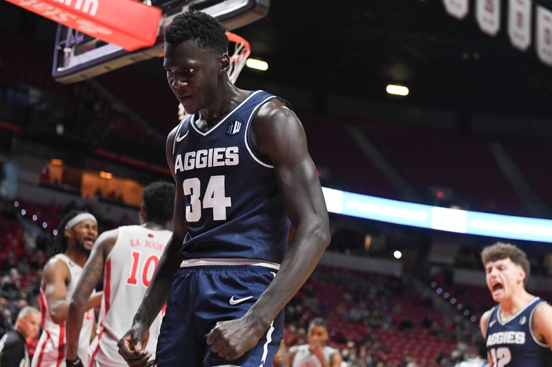 Jan 13, 2024; Las Vegas, Nevada, USA; Utah State Aggies forward Kalifa Sakho (34) reacts to a play against the UNLV Rebels in the second half at Thomas & Mack Center. Mandatory Credit: Candice Ward-USA TODAY Sports