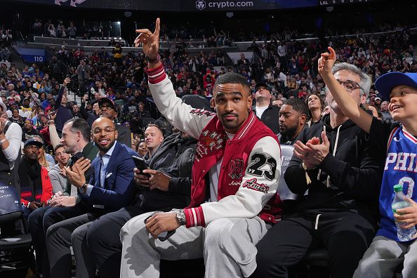 PHILADELPHIA, PA - NOVEMBER 27: Jalen Hurts sits court side during the game between the Los Angeles Lakers and the Philadelphia 76ers on November 27, 2023 at the Wells Fargo Center in Philadelphia, Pennsylvania NOTE TO USER: User expressly acknowledges and agrees that, by downloading and/or using this Photograph, user is consenting to the terms and conditions of the Getty Images License Agreement. Mandatory Copyright Notice: Copyright 2023 NBAE (Photo by Jesse D. Garrabrant/NBAE via Getty Images)